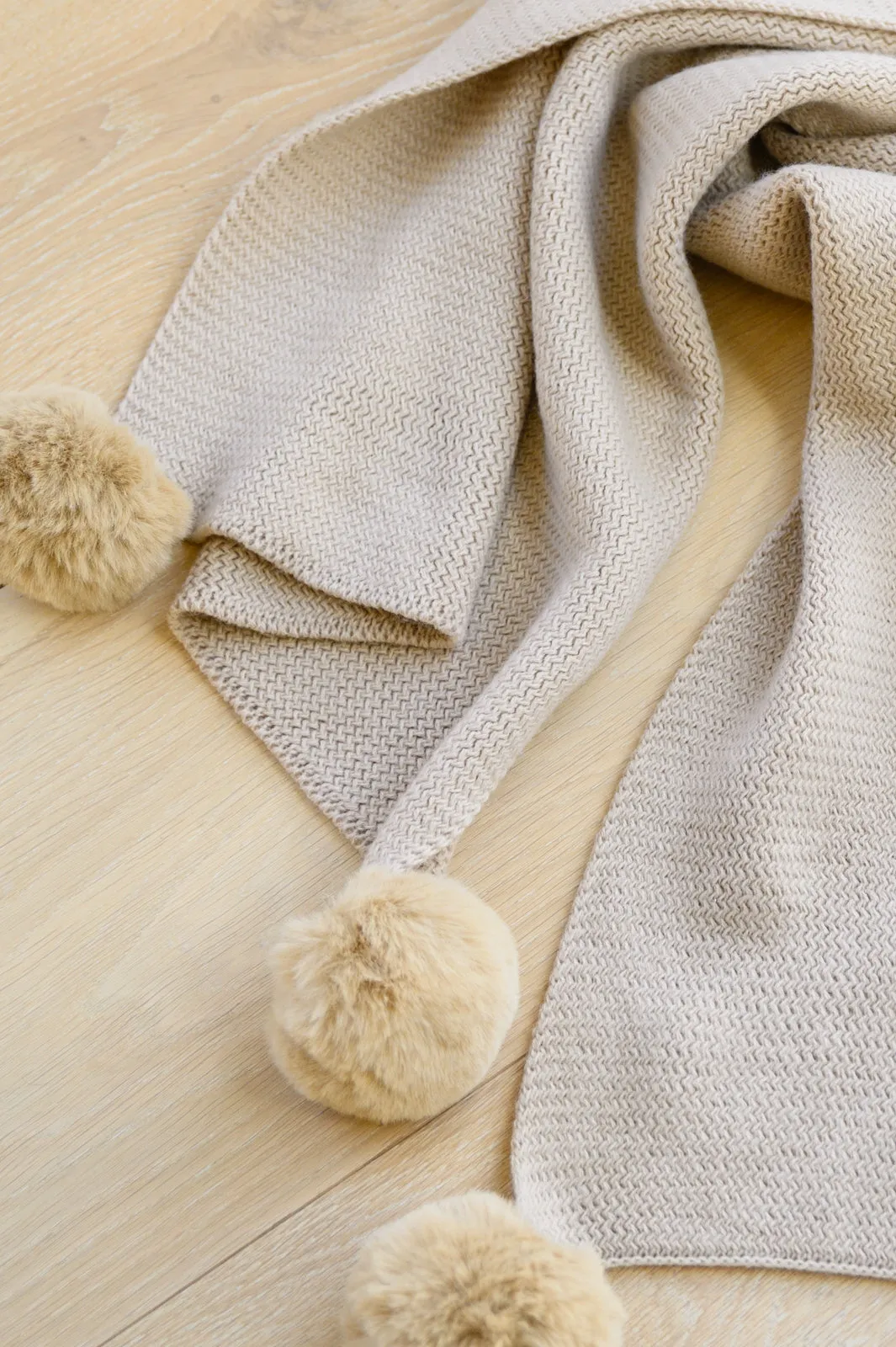 Knitted Fuzzy Pom Pom Scarf In Beige